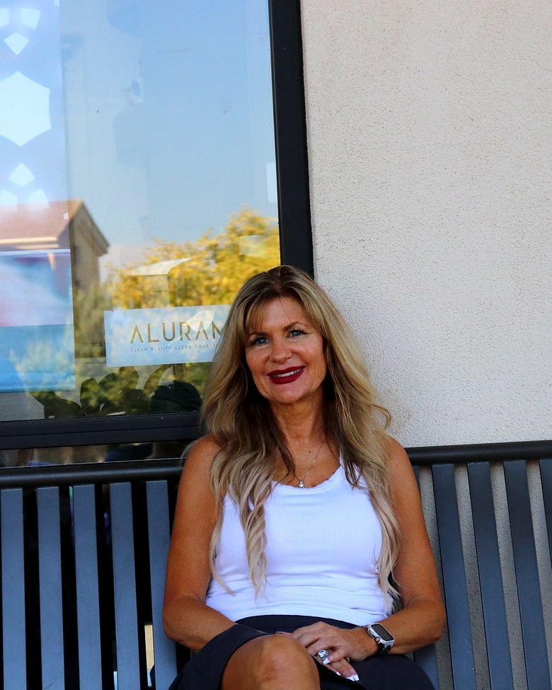 Cindy outside the salon on Twelve Bridges Drive