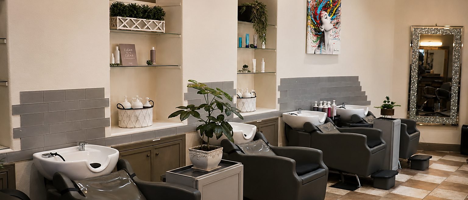 The wash stations at Lincoln Salon & Spa, beneath arched alcoves